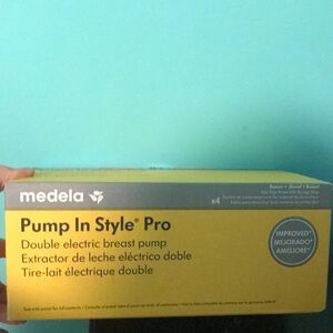 New Medela Pump In Style Pro Yellow Box
